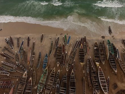 Aerial zenith photo of many fishing  boats moored on the sand. Port Peche, Mauritania